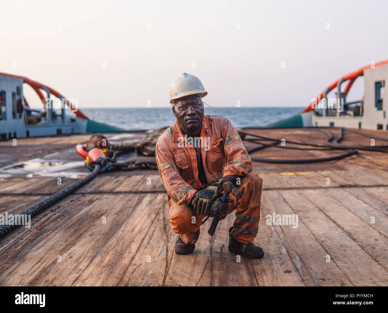 Seaman AB or Bosun on deck of offshore vessel or ship Stock Photo Alamy