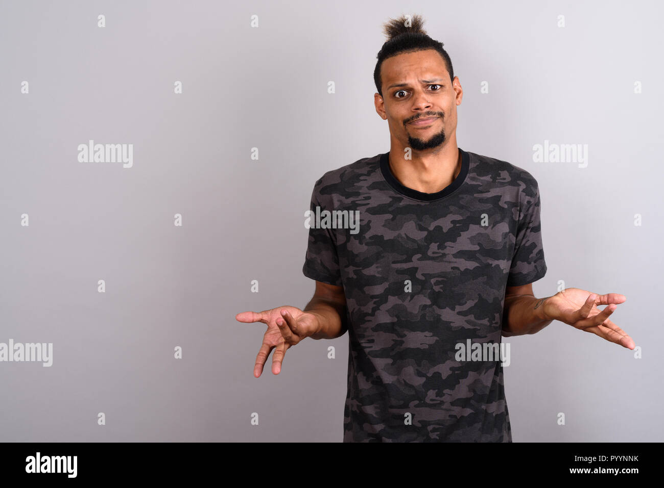 Confused bearded young man hi-res stock photography and images - Alamy