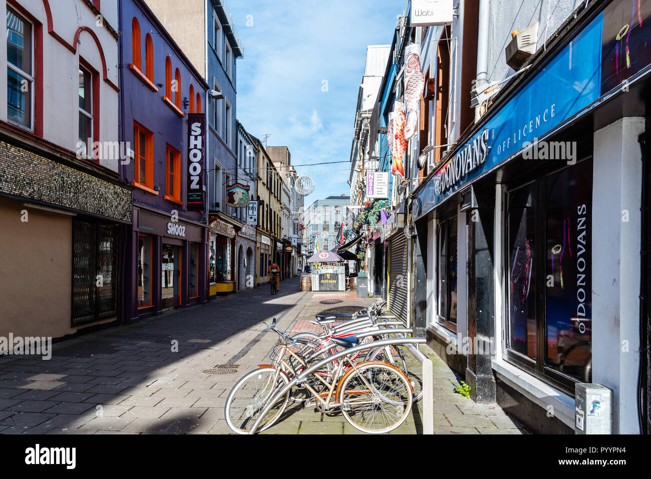 Cork, Ireland - November 12, 2017: Pedestrian street in Cork. It is typical shopping street in the center of Cork Stock Photo