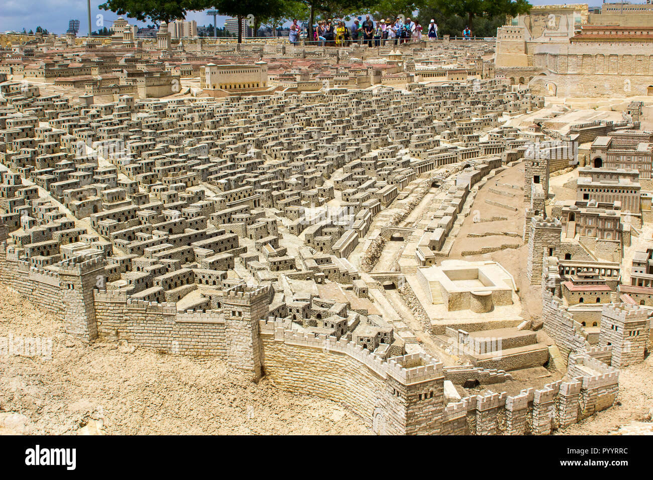 9 May 2018 Visitors walk around the outdoor scale model of the ancient city of Jerusalem at the Israel Museum in Jerusalem. The model has many arbitra Stock Photo