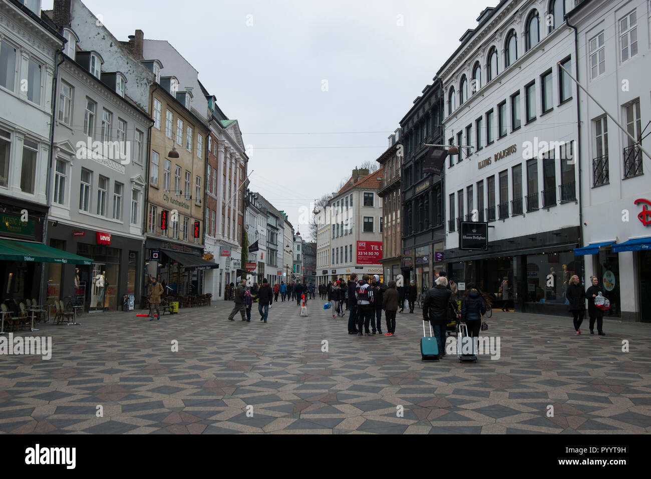 Shopping along Amagertorv street in Copenhagen, Denmark in winter. Stock Photo