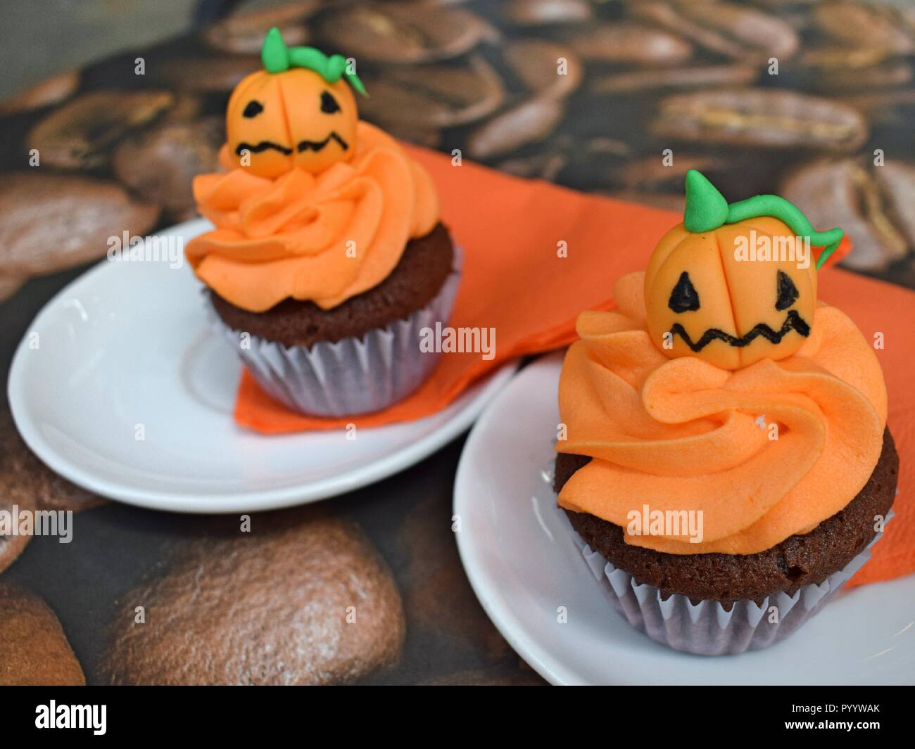 Orange Pumpkin Cupcakes Halloween Pastry Muffins With The Glaze Marzipan Figures Yummy Dessert Trick Or Treat Sweet Treat Coffee Shop Cafe Stock Photo Alamy