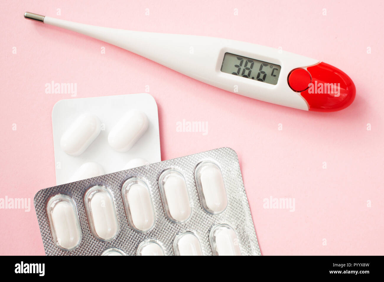 https://c8.alamy.com/comp/PYYX8W/white-digital-clinical-thermometer-shows-fever-heat-temperature-and-pills-on-pink-background-PYYX8W.jpg