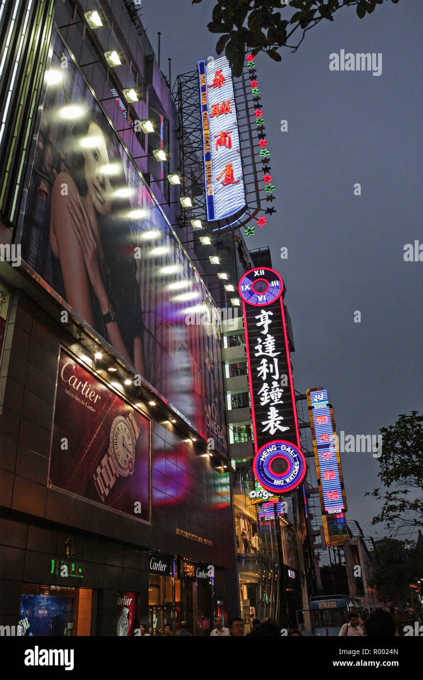Illumated signs at night, Nanjing Road, Shanghai, China Stock Photo