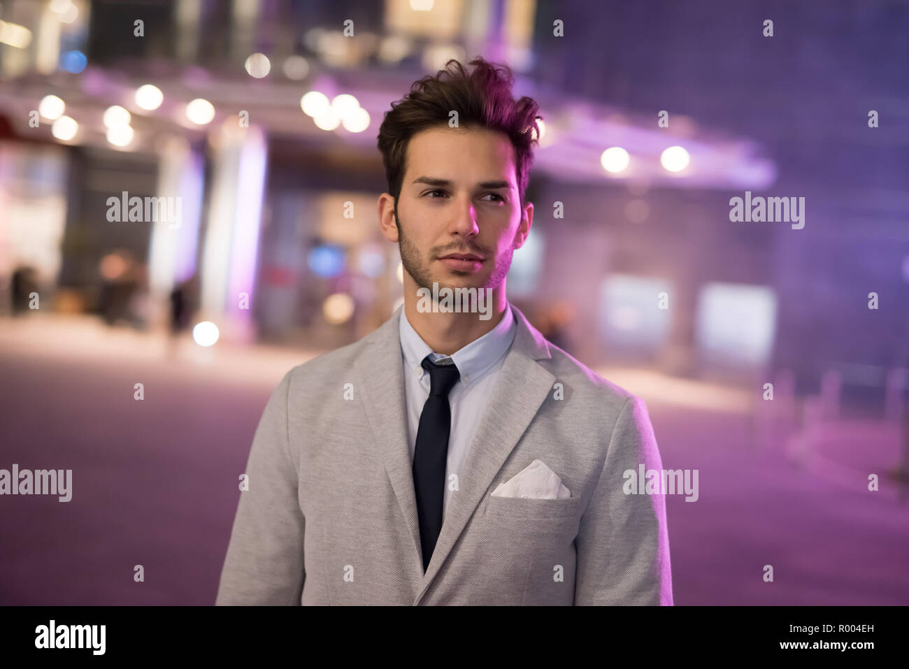 Portrait of a businessman at night Stock Photo - Alamy