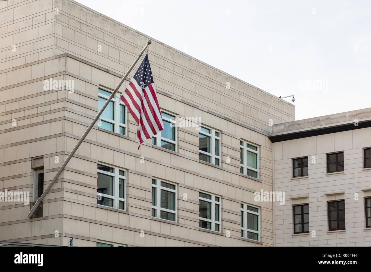 American embassy building in Berlin, Germany, against blue sky background, wallpaper. Stock Photo