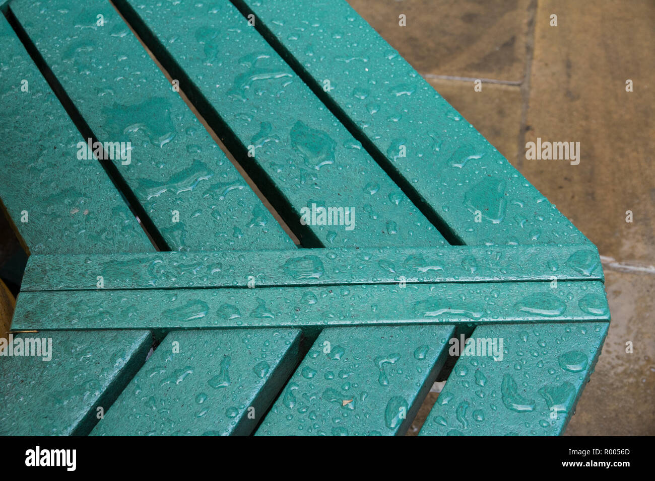 Neil's Yard: Seven Dials, rain splattered seat Stock Photo