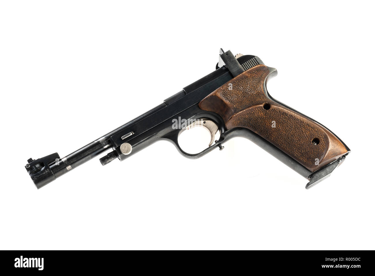 isolated used old sports pistol on a white background Stock Photo - Alamy