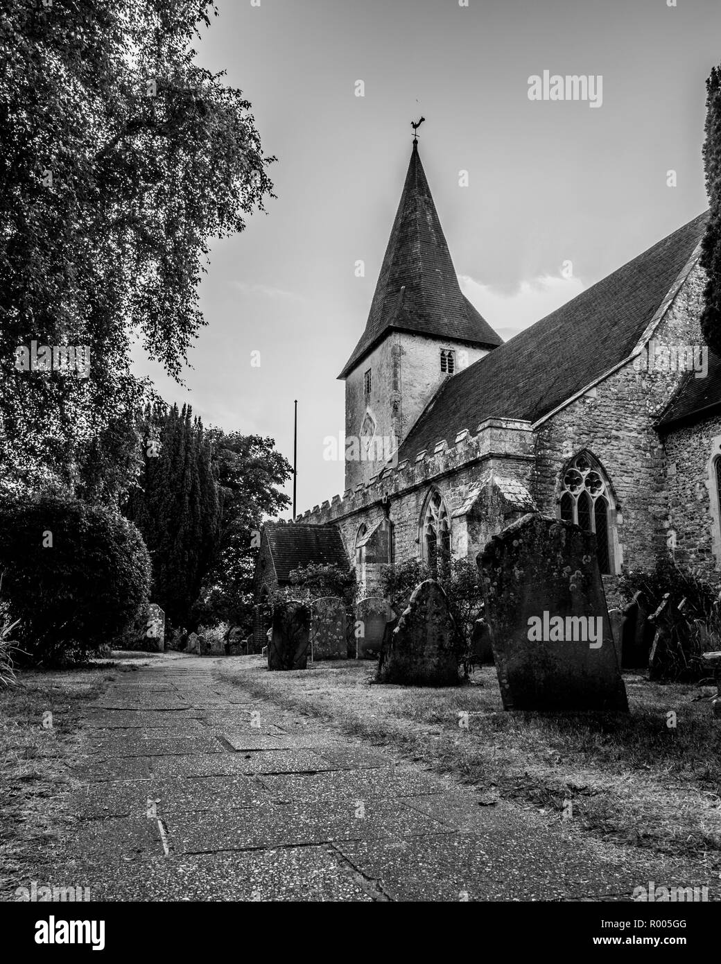 Holy trinity church at bosham, a typical old english church with a small steeple Stock Photo