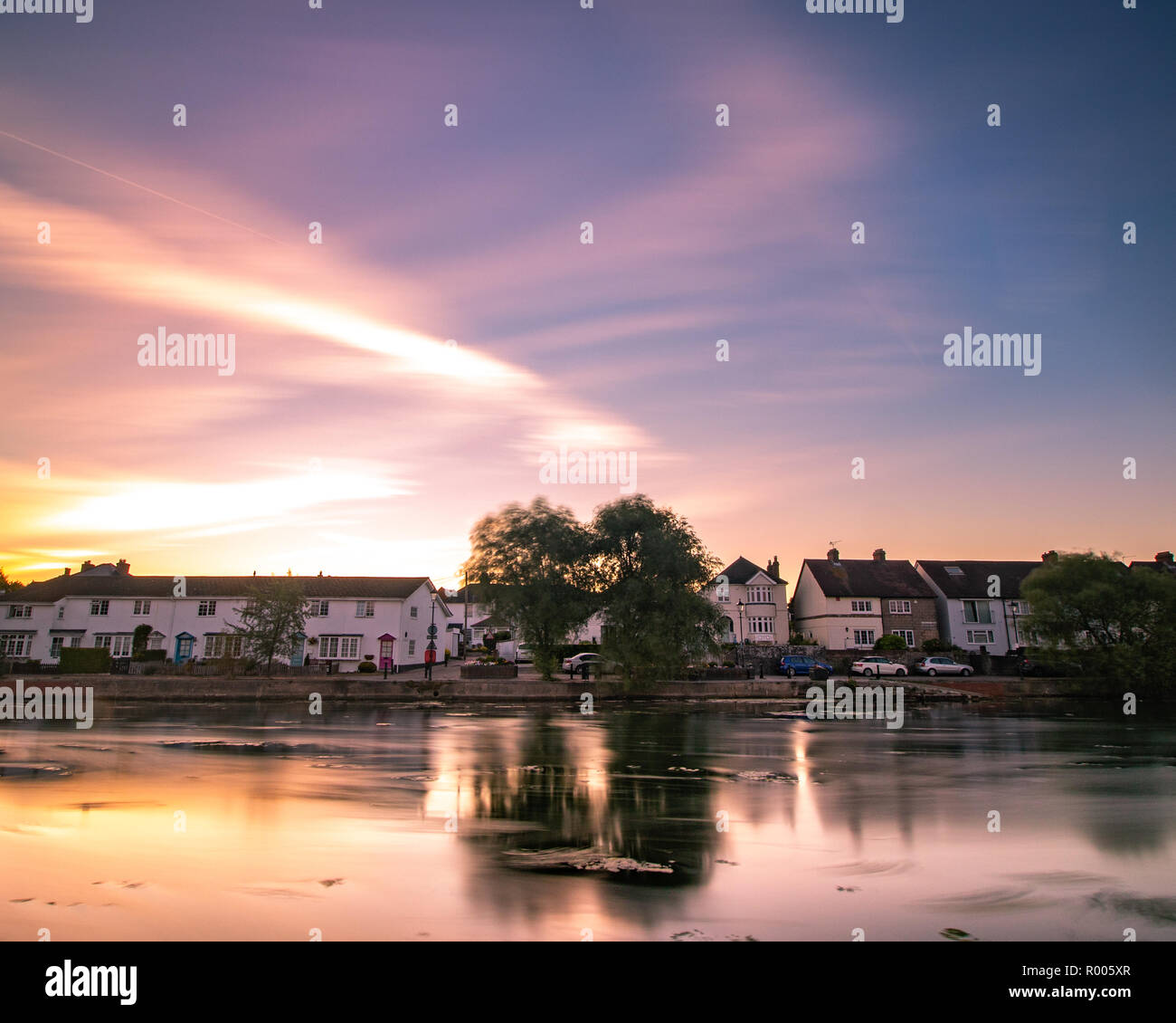 Long exposure sunrise, looking over Emsworth mill pond at the cottages