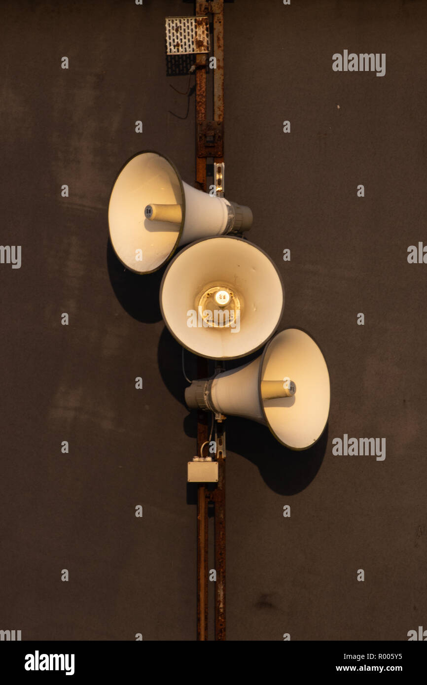 tannoy Loud speakers on Rusty metal wall Stock Photo