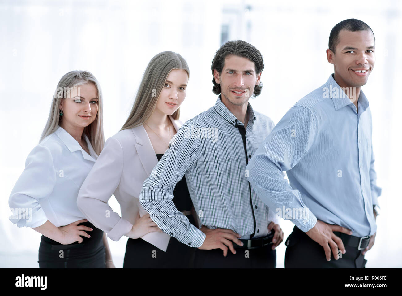 Happy smiling multi ethnic business team in office Stock Photo - Alamy