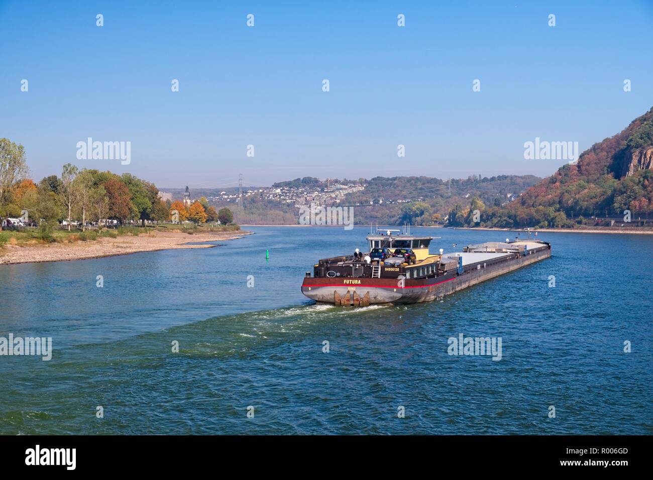 DOUBLE LENGTH BARGE EMERGING FROM THE MOSEL ON TO THE RIVER RHINE, KOBLENZ, GERMANY Stock Photo