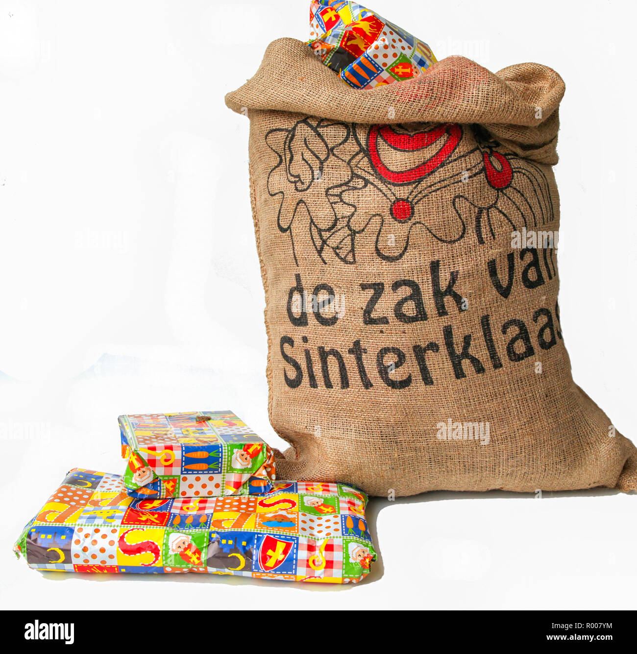Dutch Sinterklaas celebration with a big bag filled with presents  (translation on bag " the bag of Sinterklaas eg Saint Nicholas Stock Photo  - Alamy