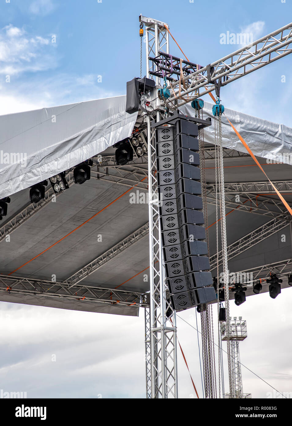stage lighting and sound equipment on the outdoor stage before a