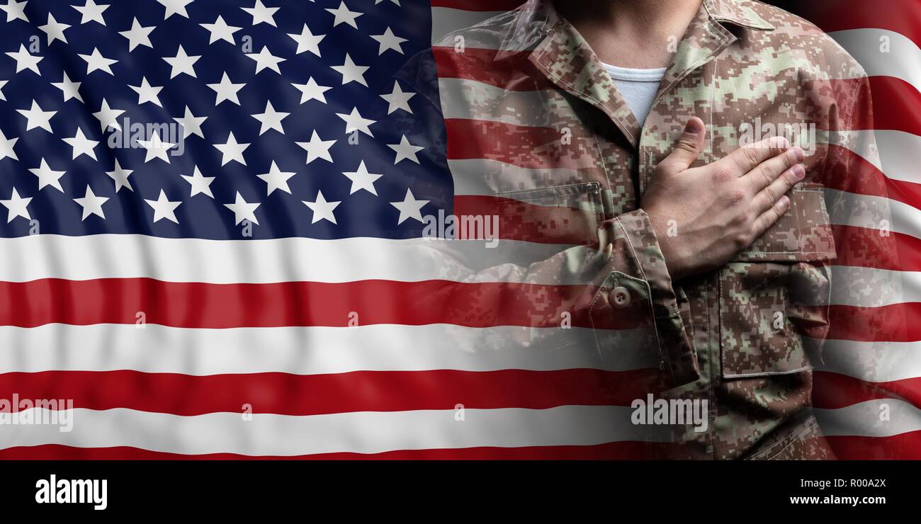 US Army concept. United States of America flag and soldier with hand on ...