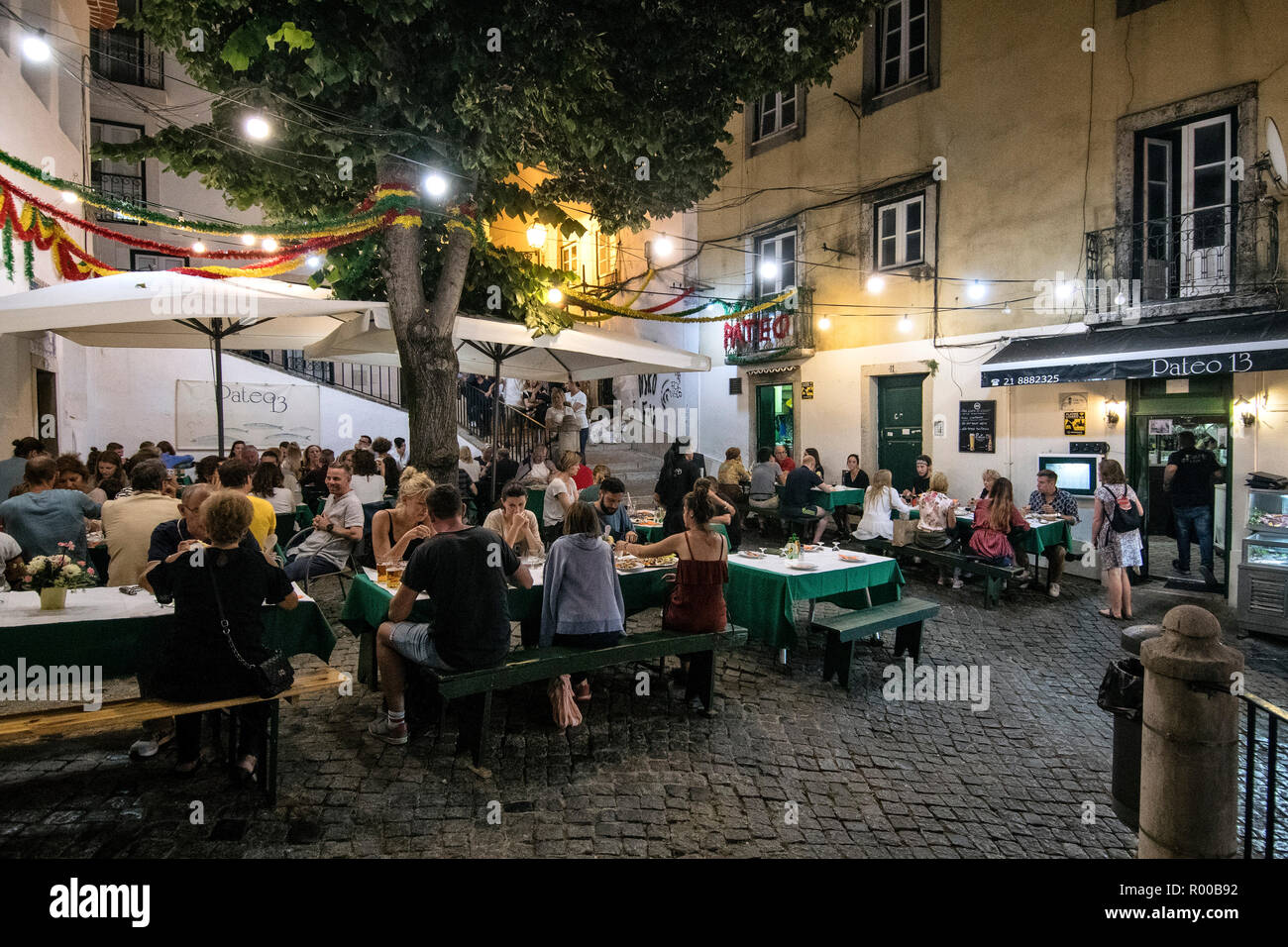 Outdoor seating area at the restaurant Pateo 13 in the Alfama district