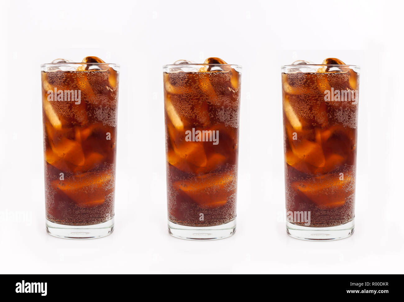 Drink cola with ice in glass on white background Stock Photo - Alamy