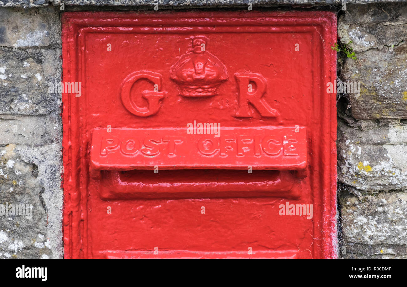Bright Red Post Box from the reign of King George V Stock Photo