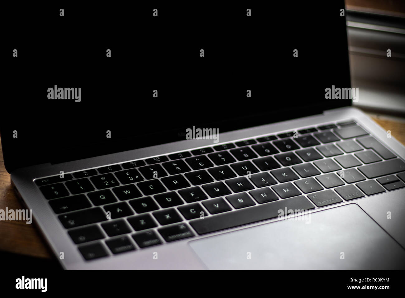 Laptop Keyboard Black close up, space grey pc Stock Photo