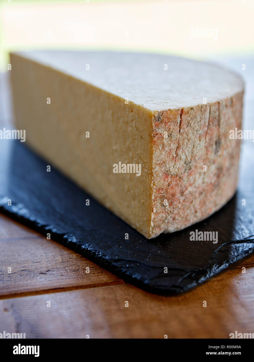 Detail focus of the rind edge of a  half round of cheese No.2 Stock Photo