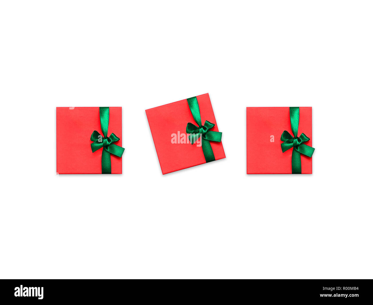 Gift boxes Christmas decor Top view Three stylish red gift boxes with ...