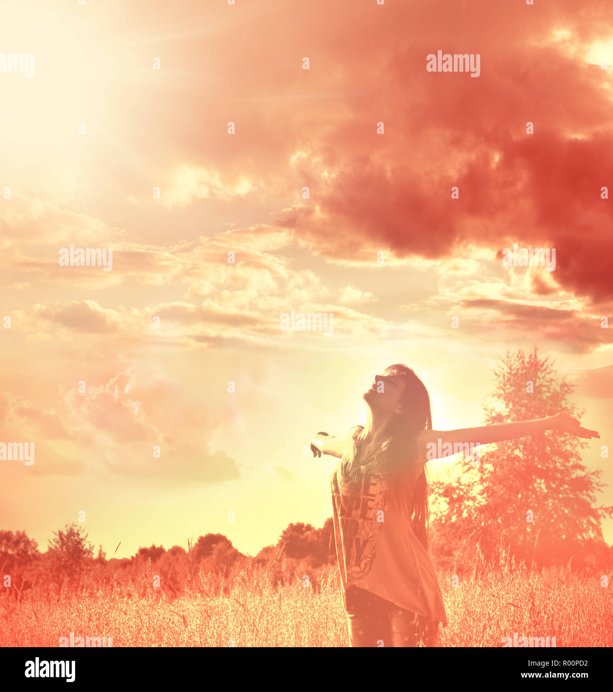Happy free woman enjoying happiness, freedom and nature Stock Photo - Alamy