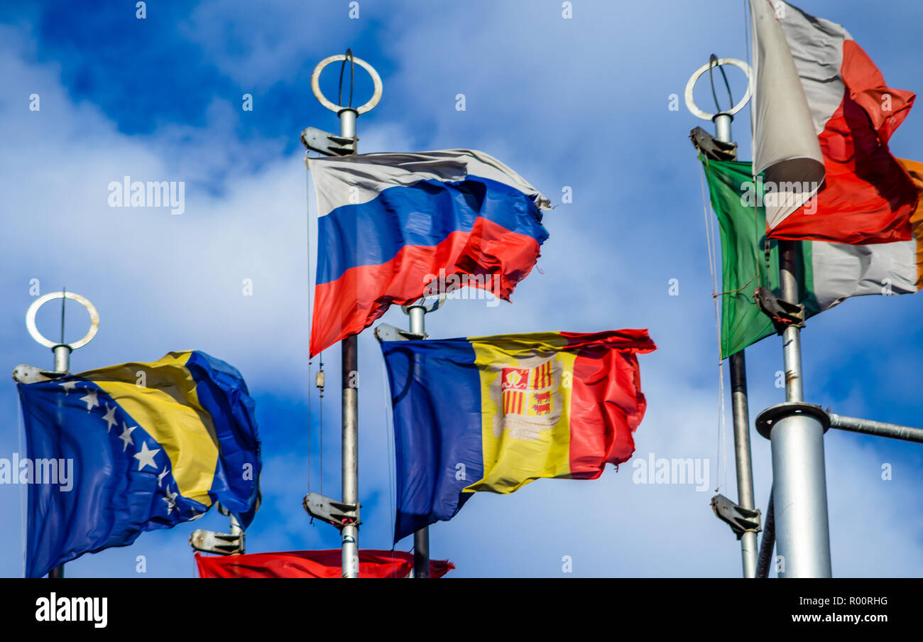 Flags of European countries on flagpoles against the blue sky Stock ...