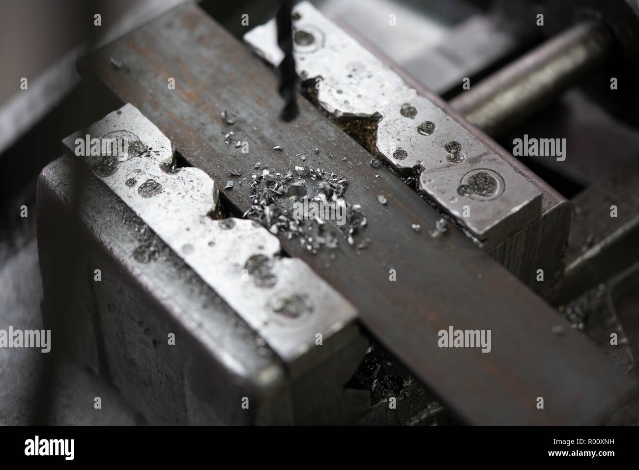 Drilling a hole into a piece of metal Stock Photo Alamy