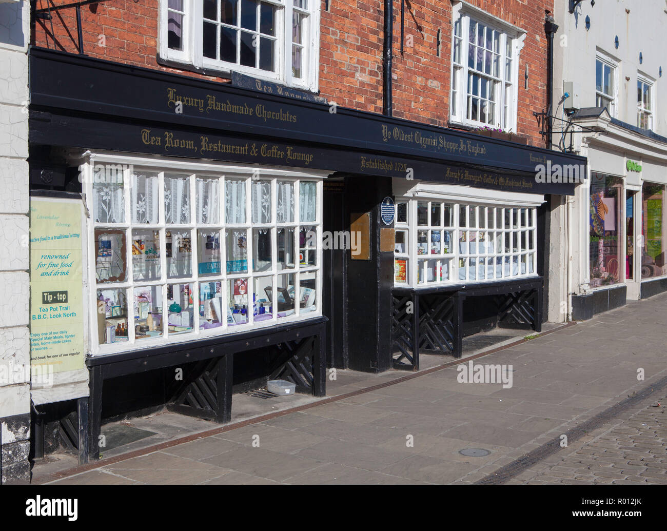 The Oldest Chemist Shop in England - located in the market place at Knaresborough, North Yorkshire Stock Photo