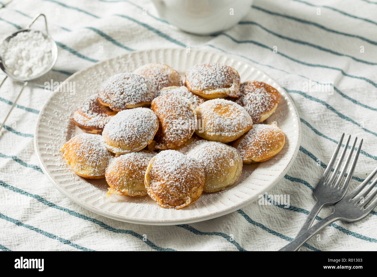Homemade Dutch Poffertjes Pancakes with Powdered Sugar Stock Photo