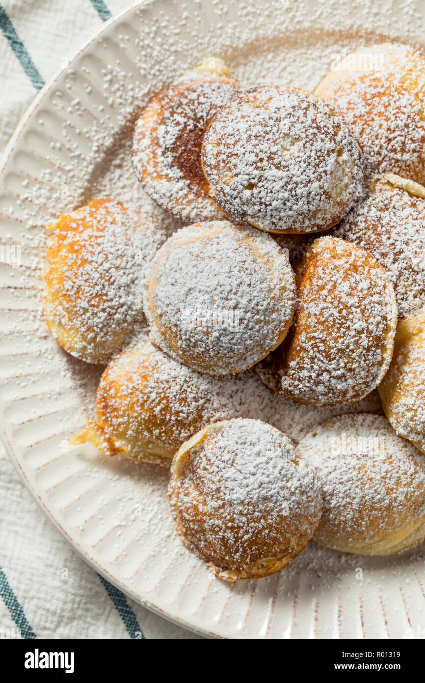 Homemade Dutch Poffertjes Pancakes with Powdered Sugar Stock Photo