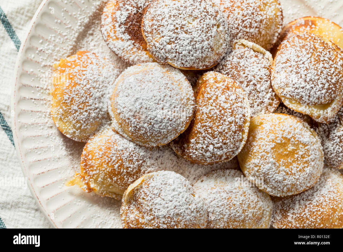 Homemade Dutch Poffertjes Pancakes with Powdered Sugar Stock Photo