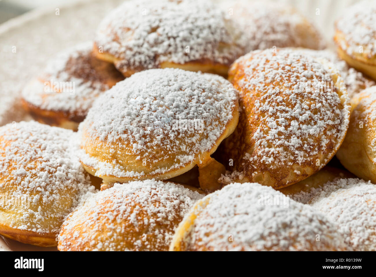 Homemade Dutch Poffertjes Pancakes with Powdered Sugar Stock Photo