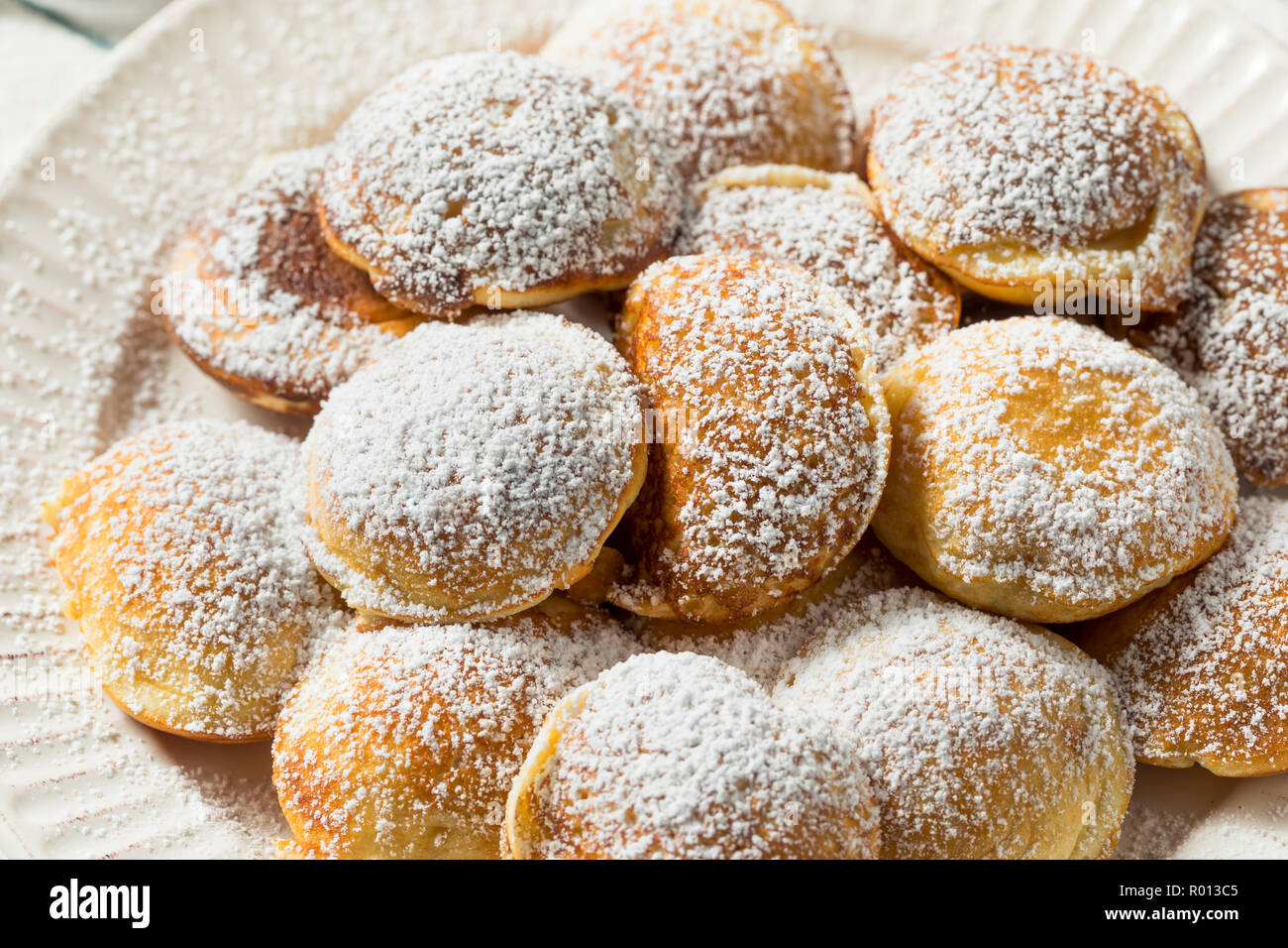 Homemade Dutch Poffertjes Pancakes with Powdered Sugar Stock Photo