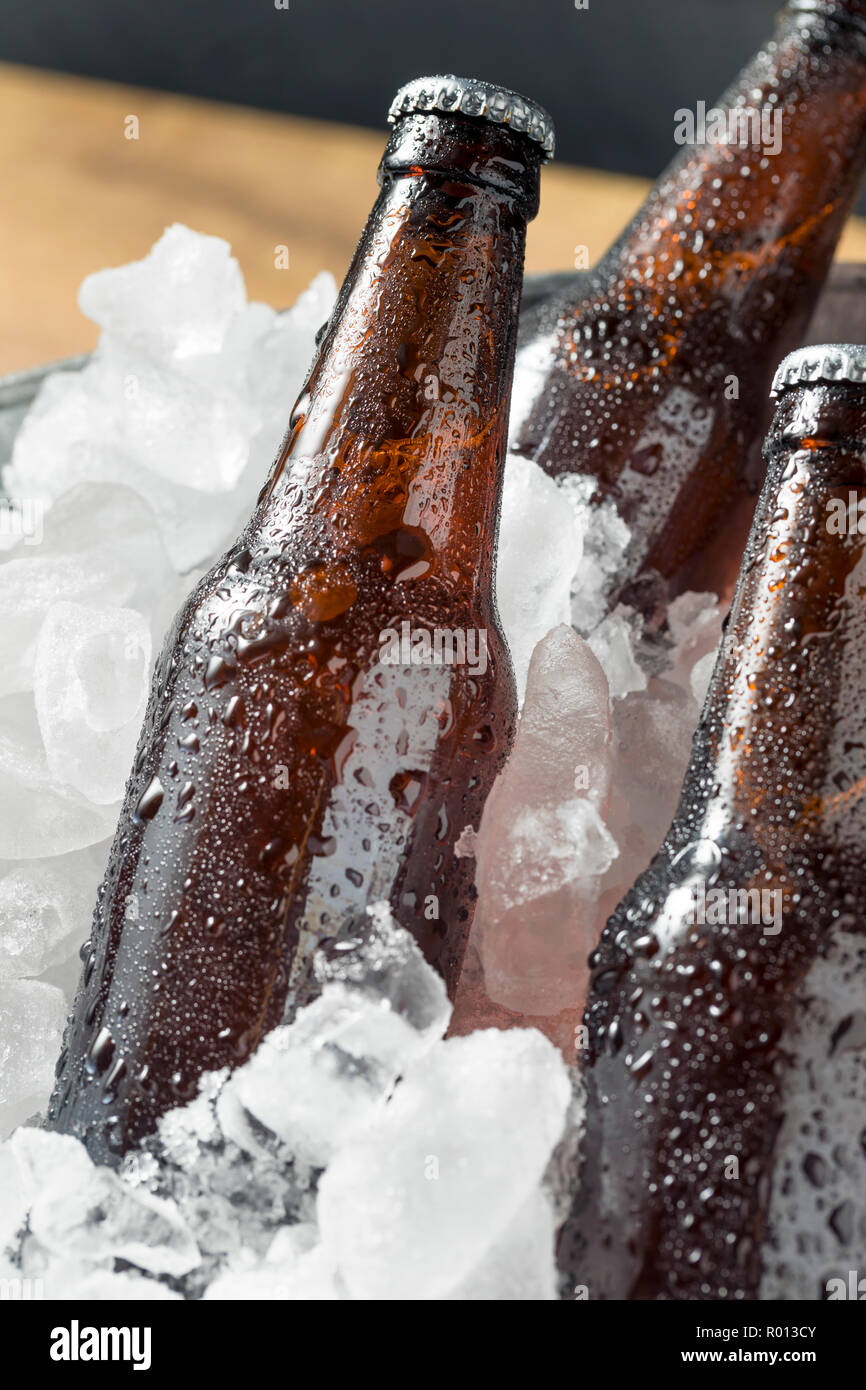 Ice Cold Bottle Of Beer Isolated On A by Lleerogers