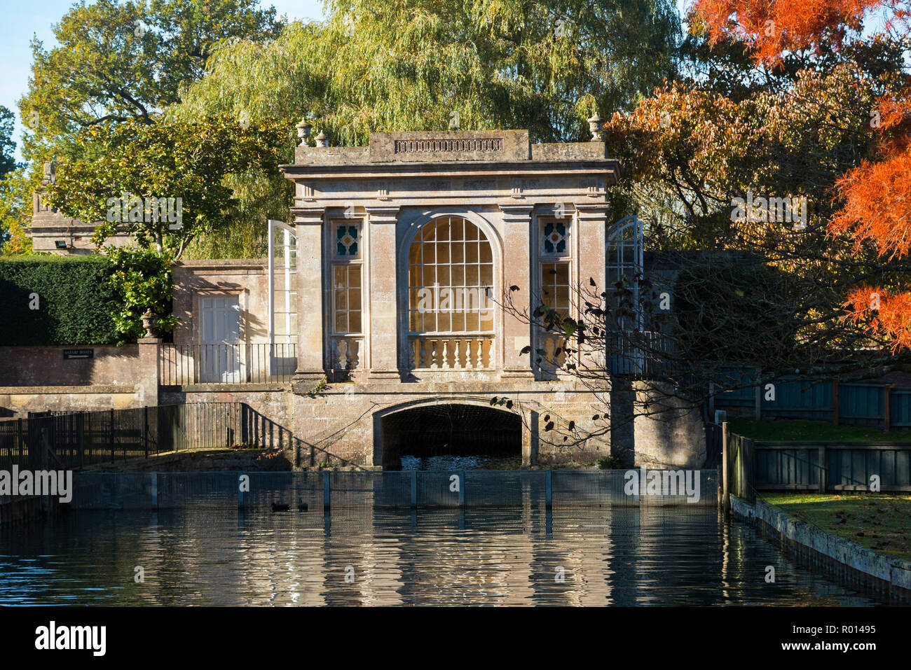 Longleat lake boat house / boathouse; original stone arch for entry to the boathouse from the lake at Longleat House ( stately home and Safari Park ) England UK (103) Stock Photo