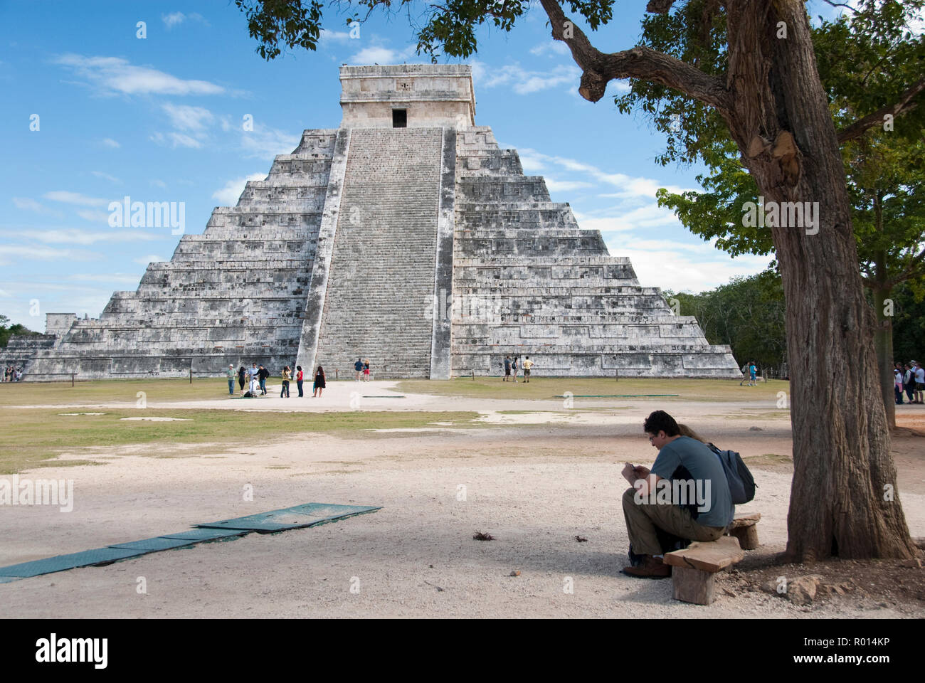 Tourists visit El Castillo, also known as the Temple of Kukulcan, a ...