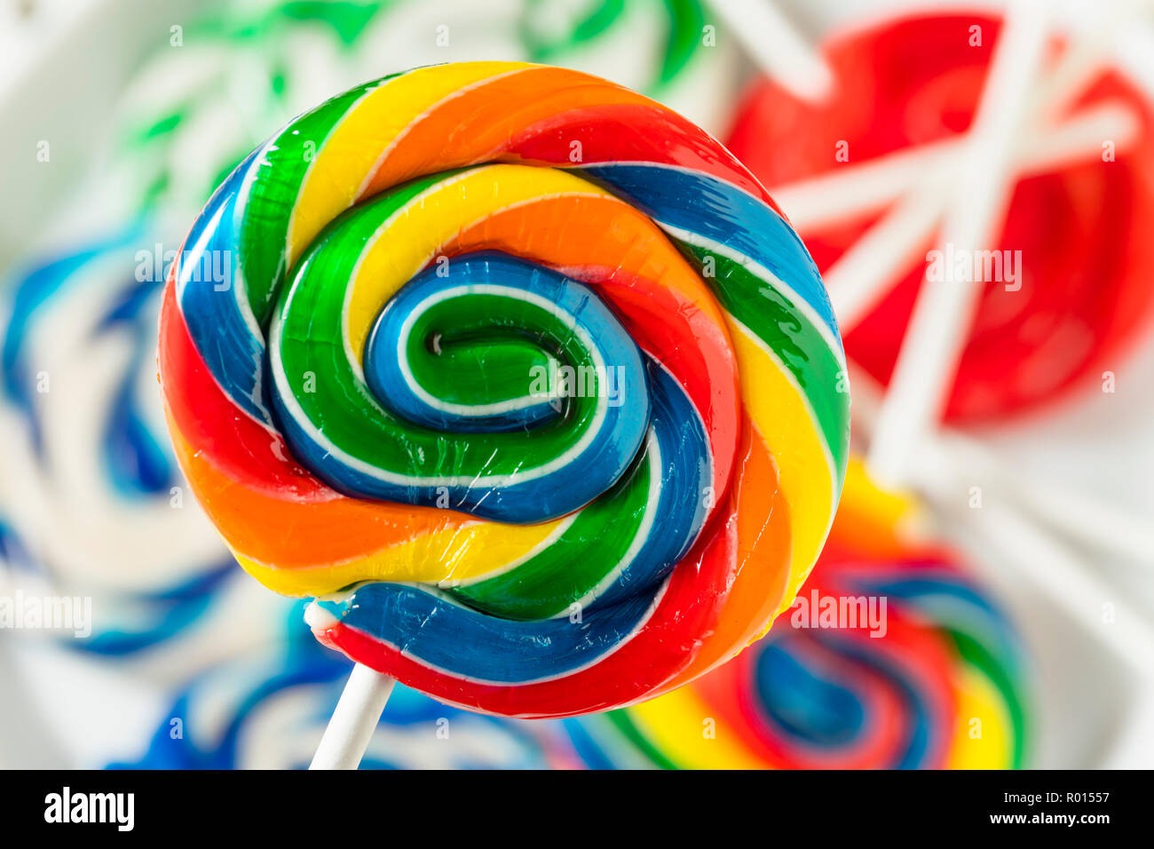 Sweet Multi Colored Lollipops on a Stick Stock Photo