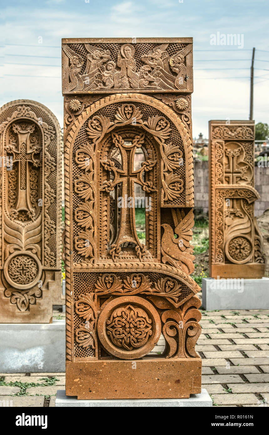 Oshakan,Armenia,19 Februar,2018: Stone cross carved with ornaments in the form of the second letter of the Armenian alphabet, created by Mesrop Mashto Stock Photo