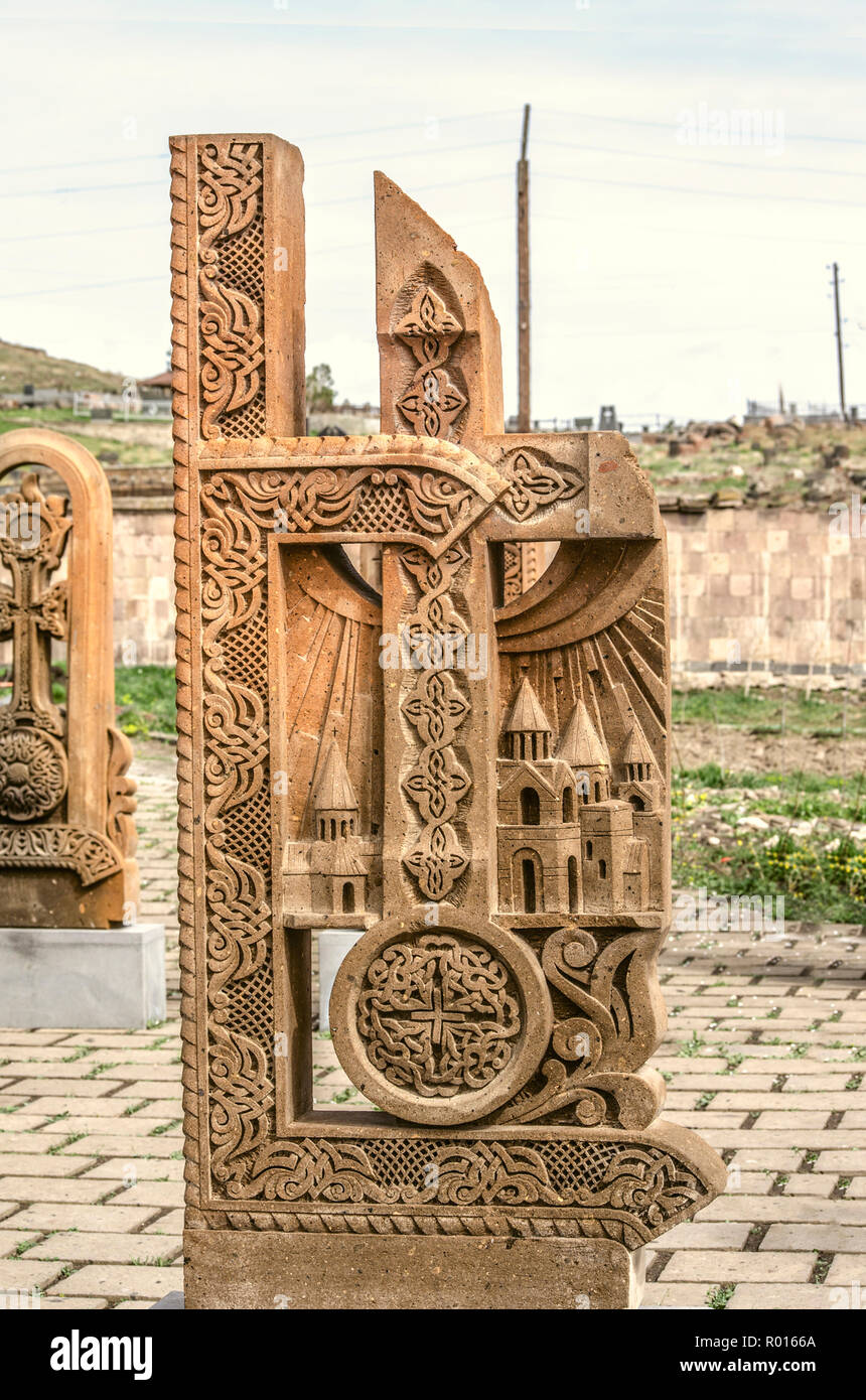 Oshakan,Armenia,19 Februar,2018: Stone cross carved with ornaments in the form of the seventh letter of the Armenian alphabet, created by Mesrop Masht Stock Photo