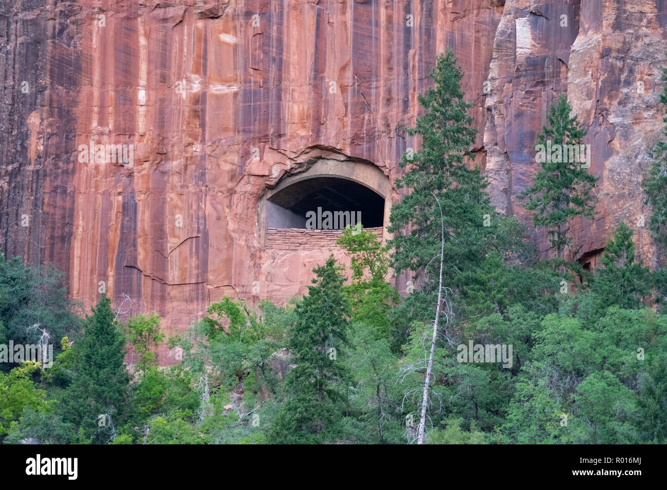 View of an old tunnel window along the Zion Mt Carmel Highway Stock