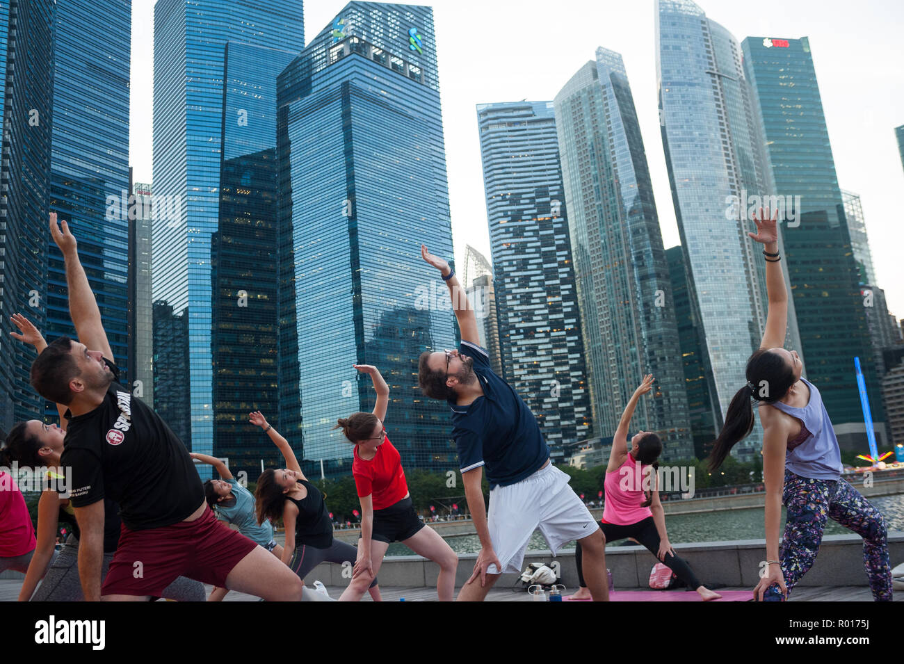 Singapore, Republic of Singapore, A Yoga Class in Marina Bay Stock Photo