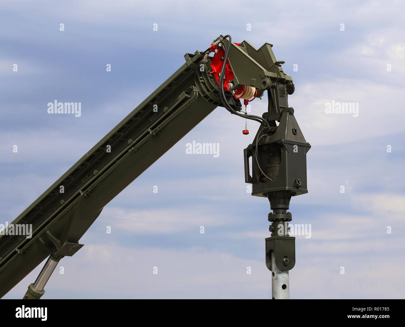 Crane boom with a drilling rig with a rotator for screw piles Stock ...