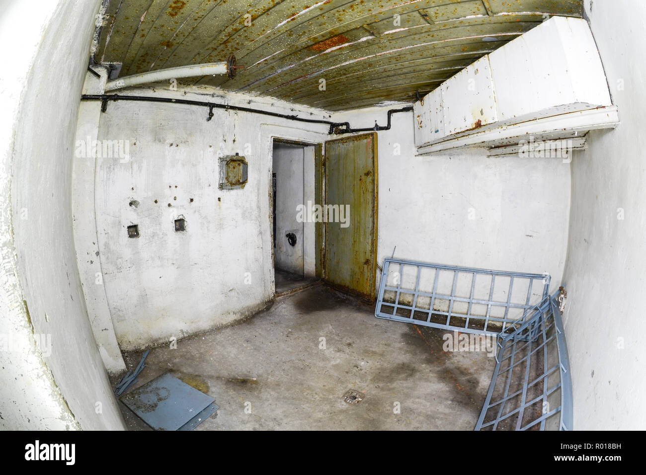 Abandoned and devastated interior of Cold War coastal defence fortification in Hel, Poland. Stock Photo