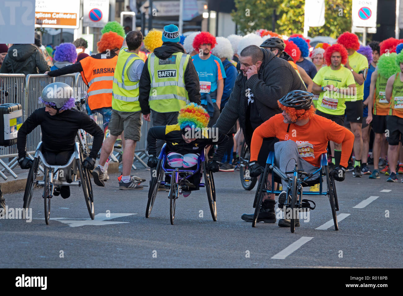 Participants in wheelchairs line up at the start of the Liverpool Scouse 5k run in Liverpool UK 2018. Stock Photo