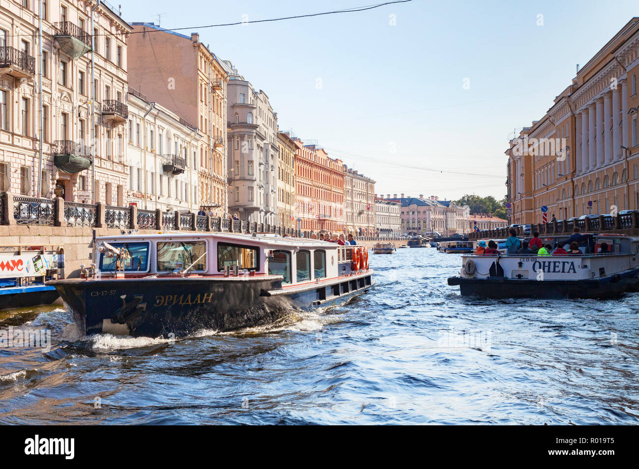 19 September 2018: St Petersburg, Russia - Sightseeing boats on the River Neva, Stock Photo