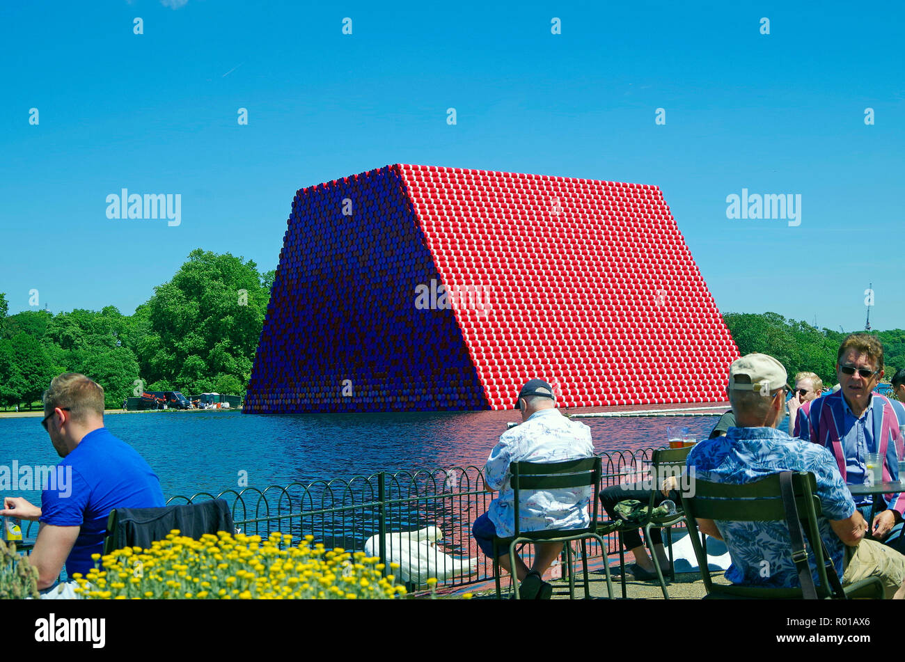 The London Mastaba, an Environmental Art work, 7506 painted oil drums floating on the Serpentine Lake in Hyde park, London. Stock Photo