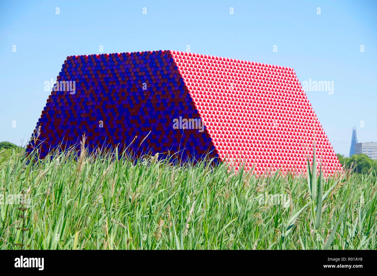 The London Mastaba, an Environmental Art work, 7506 painted oil drums floating on the Serpentine Lake in Hyde park, London. Stock Photo