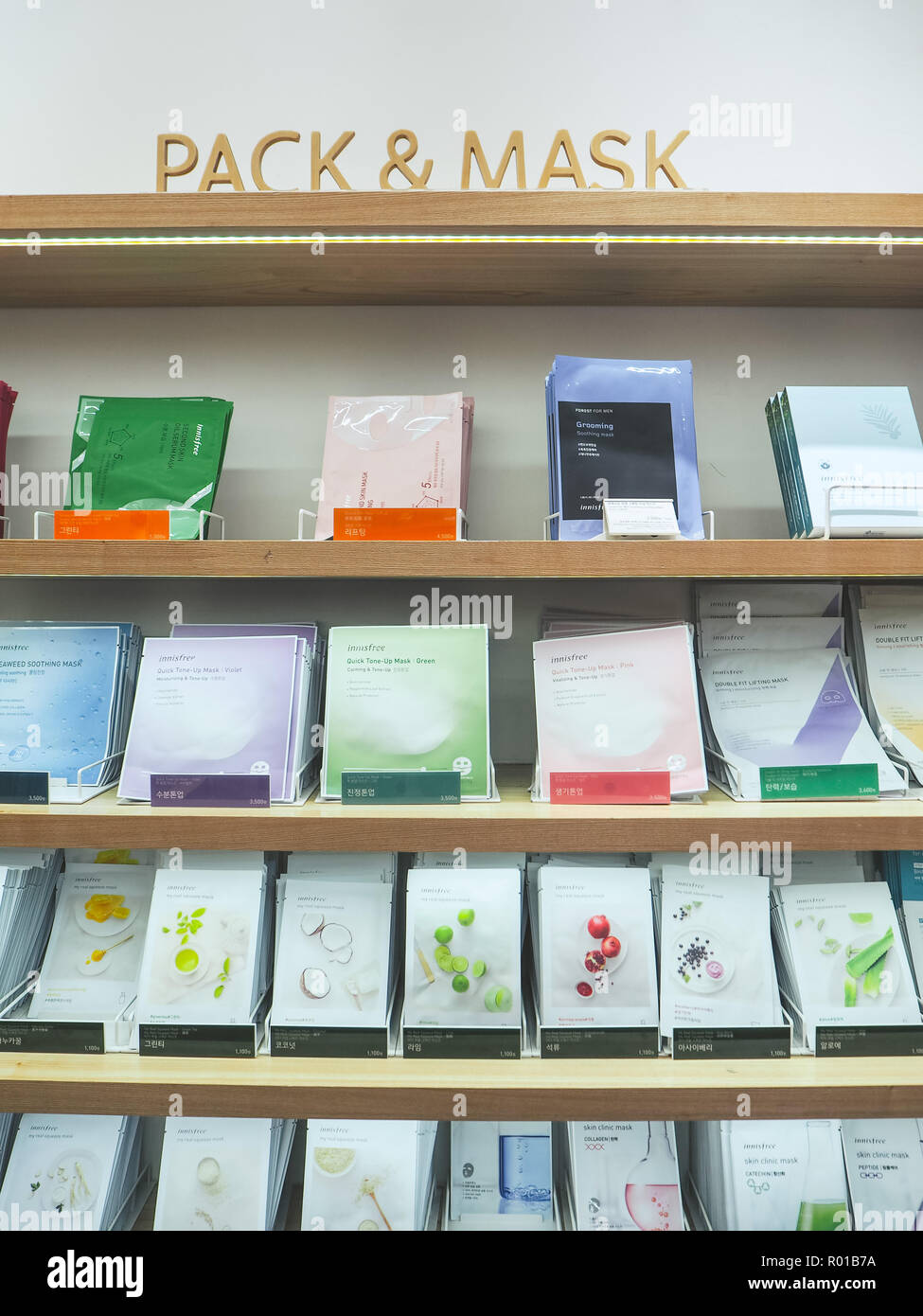 October 2018 - Seoul, South Korea: Wall with facial sheet mask from the SOuth Korean comestic brand Innisfree, known for its all-natural products. Stock Photo